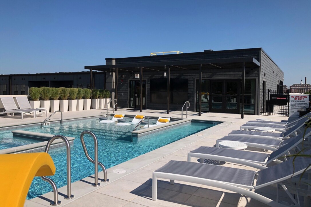 Rooftop amenity space in St Louis with porcelain paver deck