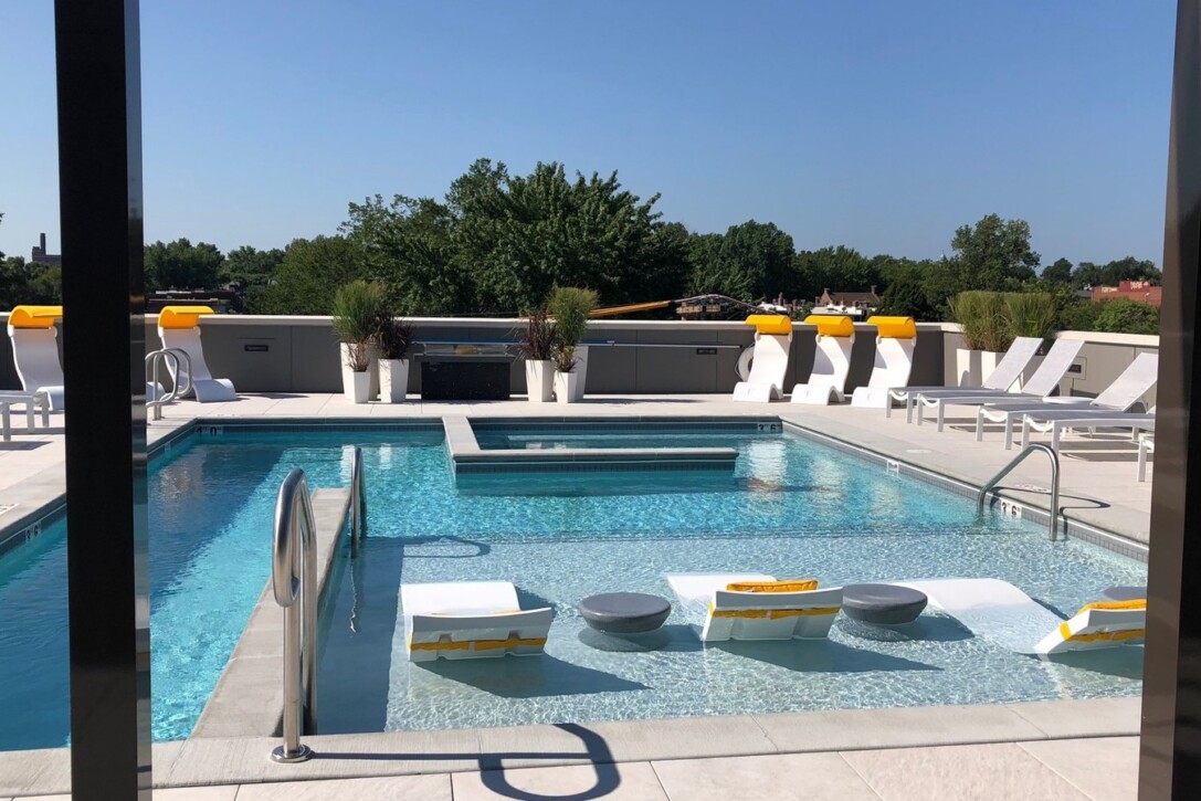 Rooftop pool deck at 1400 Russell Apartments with porcelain paver system